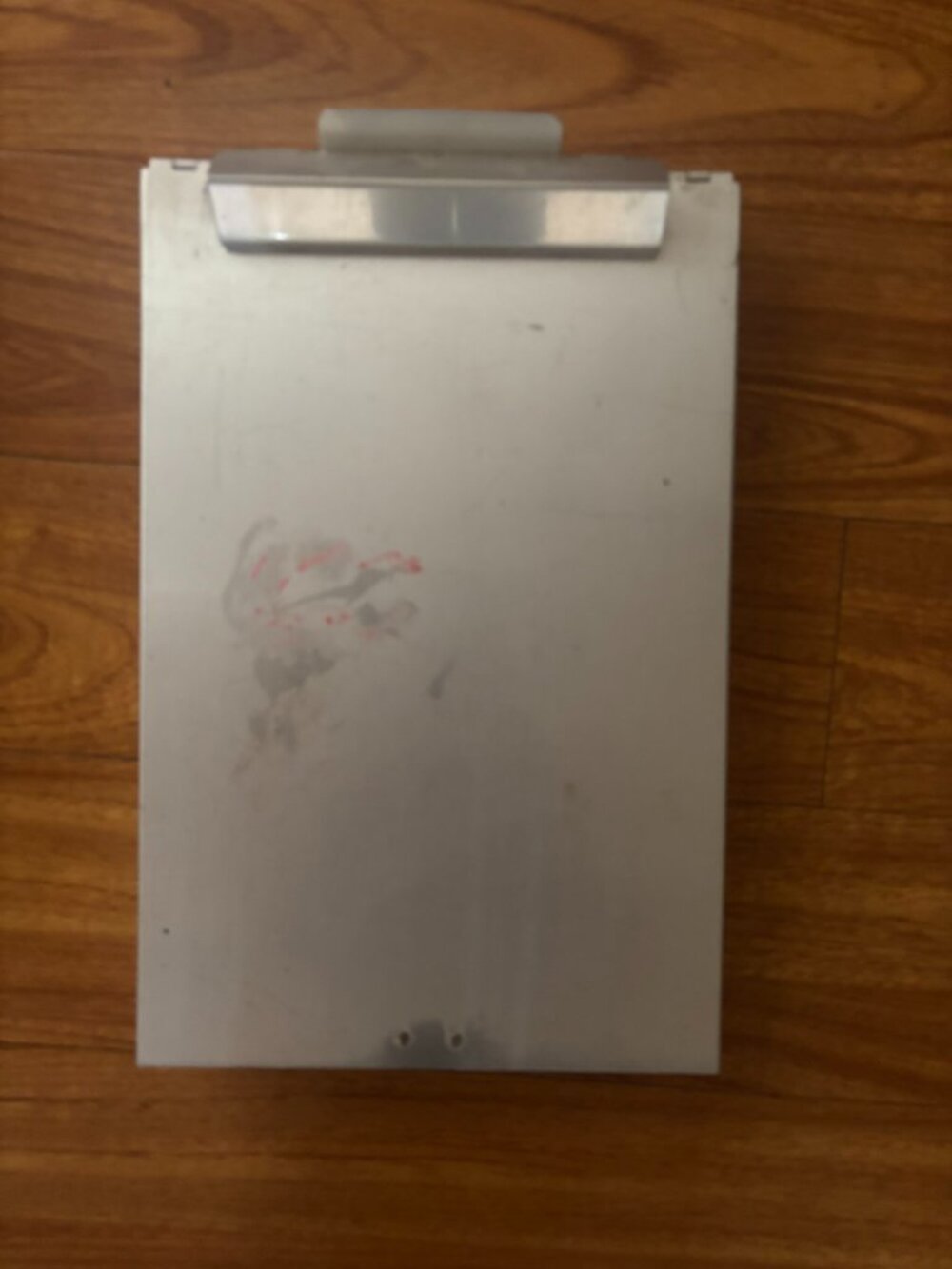 Used, metal clip board with storage.